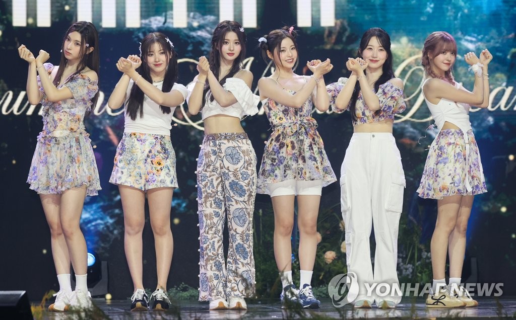 K-pop girl group Nmixx members pose for a photo during a showcase event for its new single, "A Midsummer Nmixx's Dream," held in Seoul on July 11, 2023. (Yonhap)