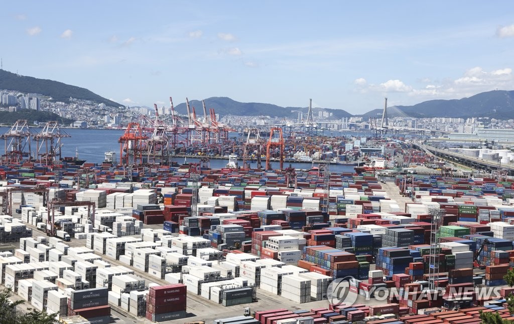 Shipping containers are stacked at a port in Busan, 320 kilometers south of Seoul, in this Aug. 1, 2023, file photo. (Yonhap)