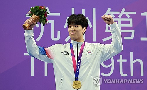 S. Korea's Ji wins swimming gold