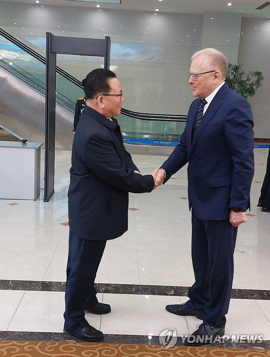 This photo, taken from the Telegram account of the Russian Embassy in North Korea, shows Ri Chung-gil (L), chairman of the North's State Commission of Science and Technology, meeting Russian Ambassador to Pyongyang Alexander Matsegora before leaving for Moscow on May 13, 2024. (PHOTO NOT FOR SALE) (Yonhap) 