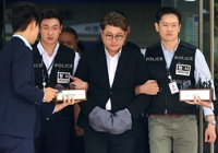El cantante de ópera pop Kim Ho-joong en el tribunal