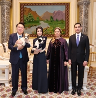 Posing with Turkmenistan's national dog breed
