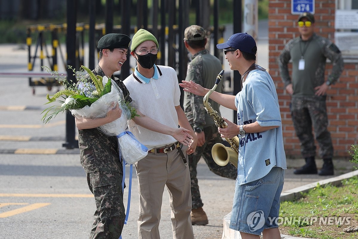 BTS' Jin returns from military duty Yonhap News Agency