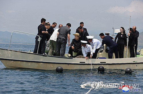 N. Korean leader inspects sea farm construction site